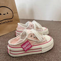 Pink tassel fringed thick soled canvas shoes for women casual and versatile board shoes