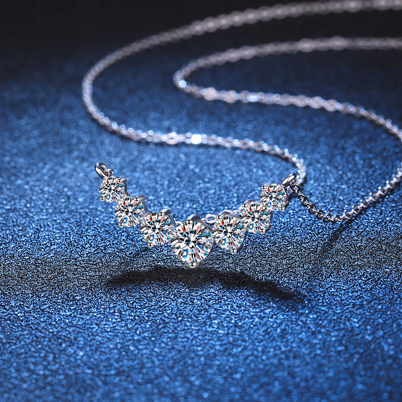 S925 sterling silver pendant for women, plated with Pt950, featuring a 1.7-carat D-color moissanite design inspired by the Seven Princesses necklace, in a traditional Chinese style.