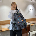 School bag for boys, junior high school students, Korean version, large capacity, high school backpack, personalized graffiti school bag, female, simple campus backpack