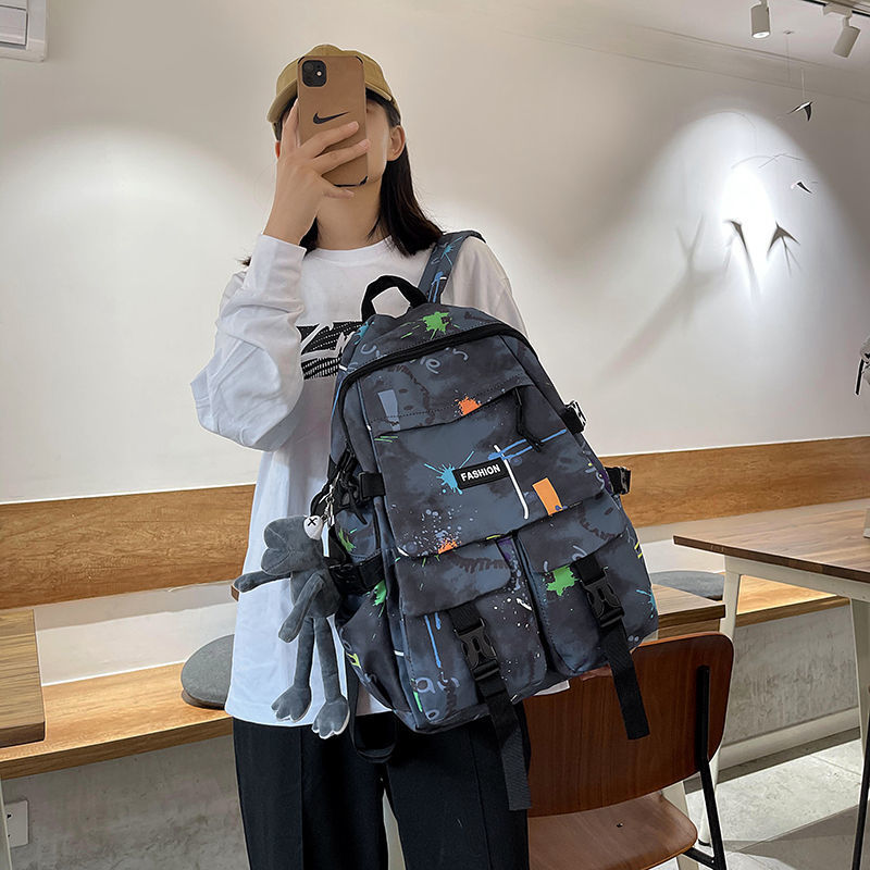 School bag for boys, junior high school students, Korean version, large capacity, high school backpack, personalized graffiti school bag, female, simple campus backpack