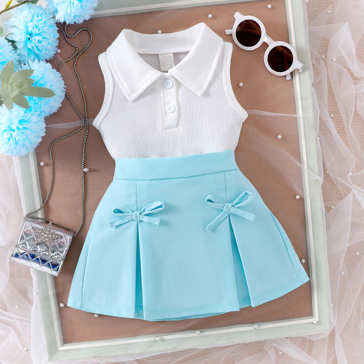 Cross-border European and American summer casual girls suits, sleeveless lapel tops for small and medium-sized children, bow short skirt two-piece suit
