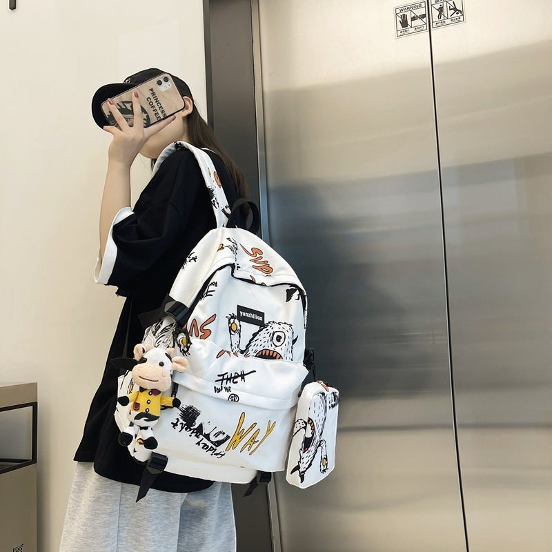 School bag male Korean version street trend junior high school student high school student backpack personality graffiti large capacity travel backpack