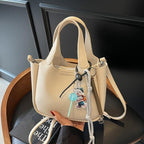 Cross-border hand-held bucket bag for women, high-end 2025 new versatile simple shoulder messenger bag niche vegetable basket bag