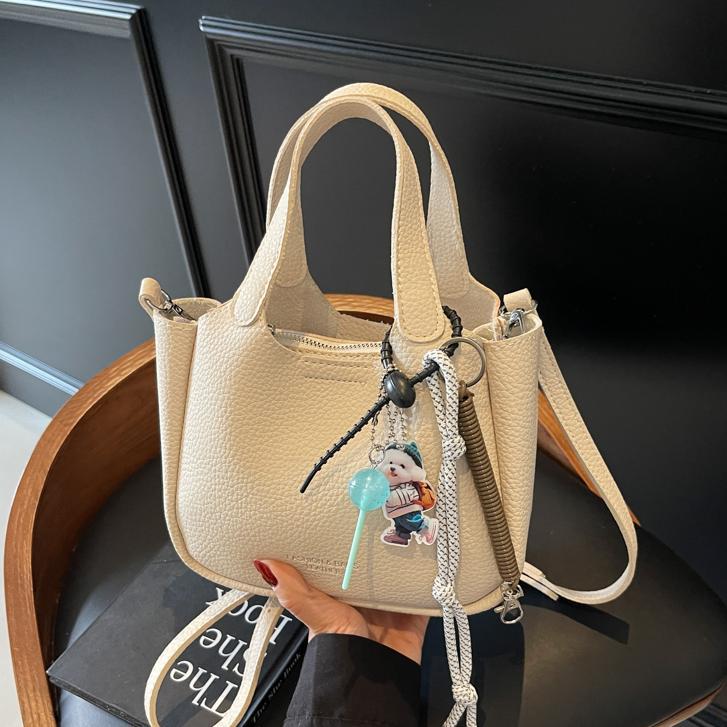 Cross-border hand-held bucket bag for women, high-end 2025 new versatile simple shoulder messenger bag niche vegetable basket bag