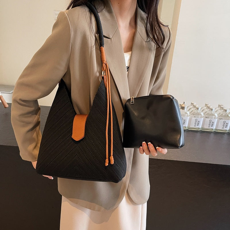 High-grade niche knitted underarm bag for women with large capacity 2025 new casual one-shoulder hand-held commuter bucket bag