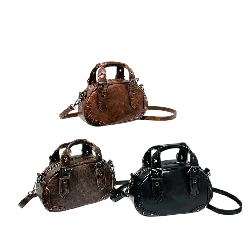 Retro niche trend rivet hand-held bowling bag female 2025 spring new high-end hot girl messenger bag