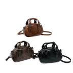 Retro niche trend rivet hand-held bowling bag female 2025 spring new high-end hot girl messenger bag