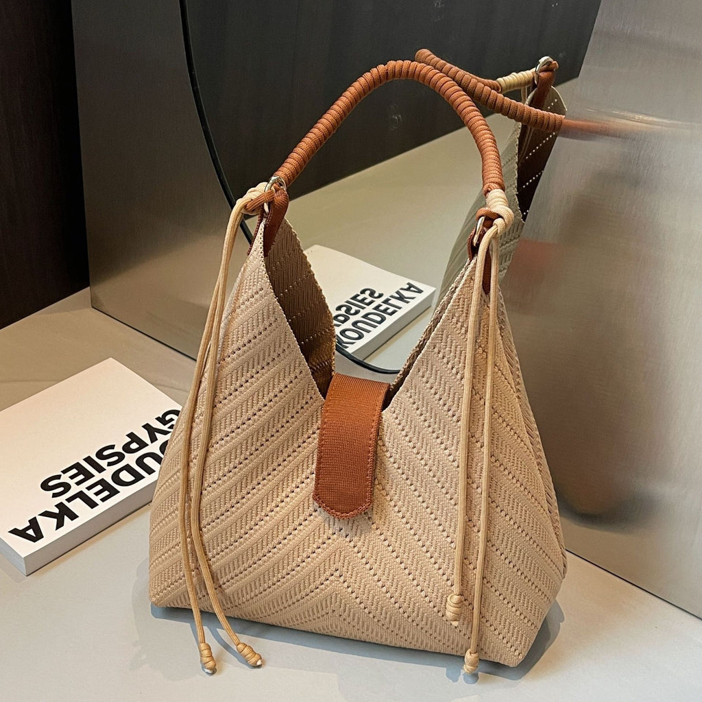High-grade niche knitted underarm bag for women with large capacity 2025 new casual one-shoulder hand-held commuter bucket bag