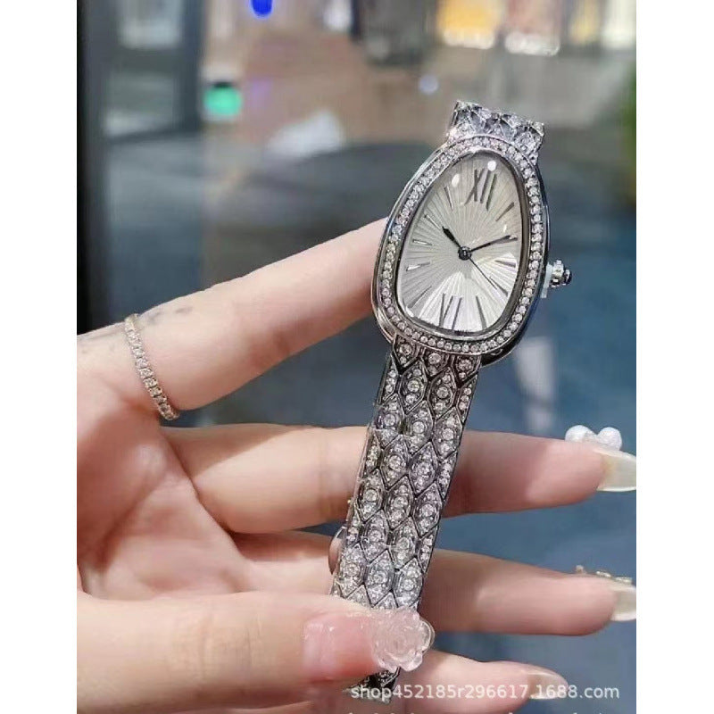 Women's Snake Pattern Crystal Watch - Sunburst Dial