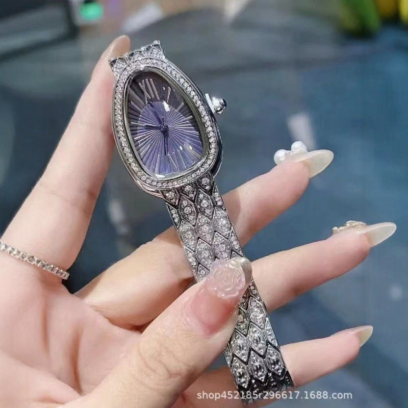 Women's Snake Pattern Crystal Watch - Sunburst Dial