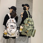 School bag male Korean version street trend junior high school student high school student backpack personality graffiti large capacity travel backpack