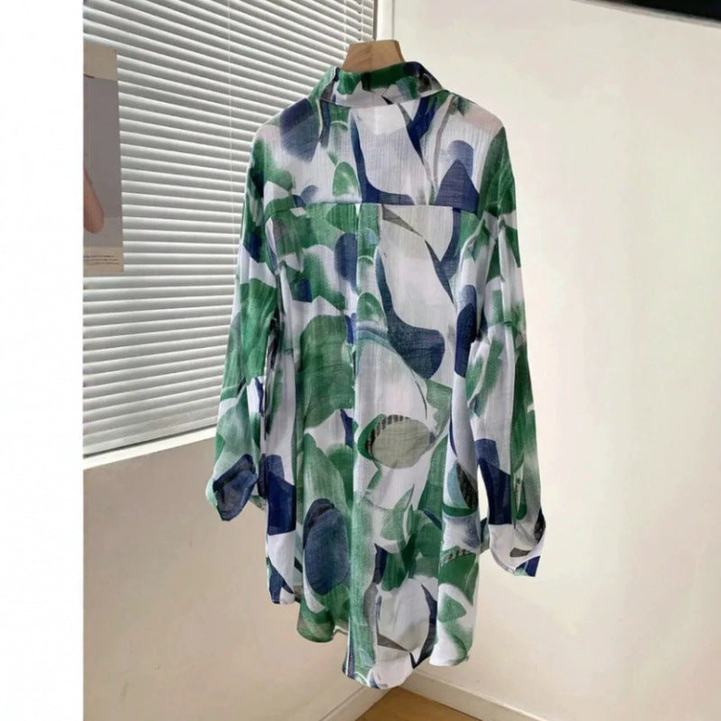Amazon mid-length loose chiffon blouse with green and blue color blocking abstract print, lightweight and breathable, 2026 European and American cross-border style.