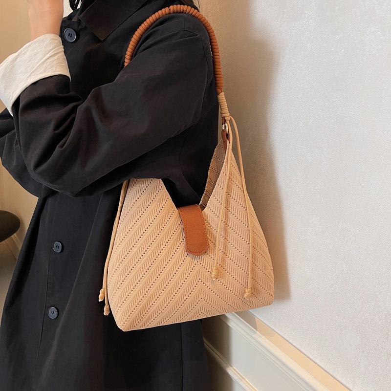 High-grade niche knitted underarm bag for women with large capacity 2025 new casual one-shoulder hand-held commuter bucket bag