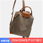 High-end women's backpack, lightweight travel bag, large capacity, nylon color-blocked waterproof school bag, business bag