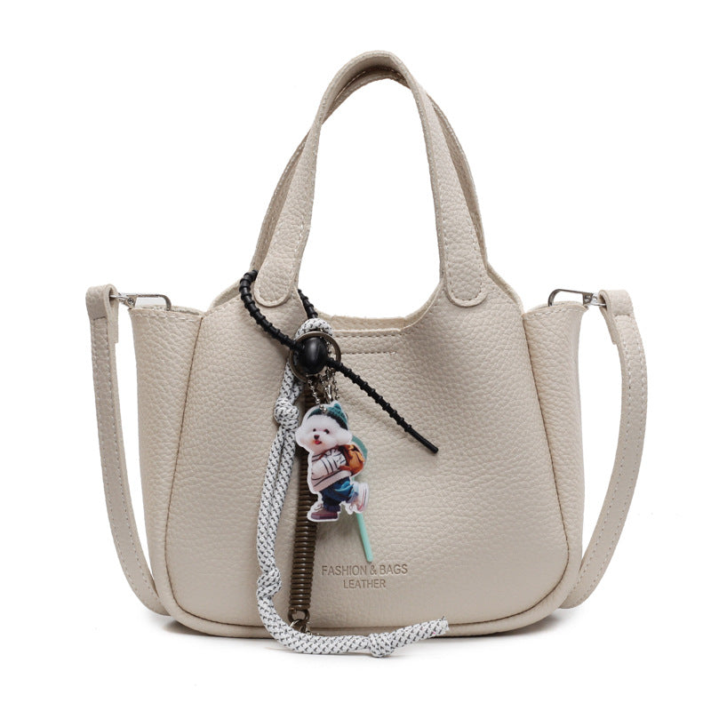 Cross-border hand-held bucket bag for women, high-end 2025 new versatile simple shoulder messenger bag niche vegetable basket bag