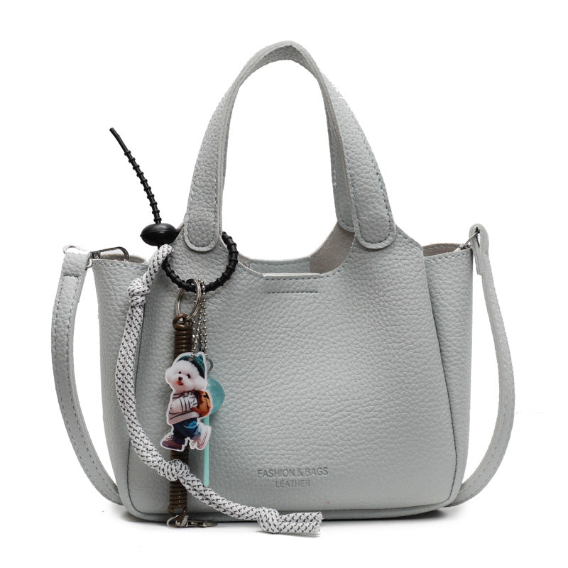 Cross-border hand-held bucket bag for women, high-end 2025 new versatile simple shoulder messenger bag niche vegetable basket bag