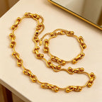 High-end stainless steel 18K handmade chain with interlocking M beads, made of gold-plated titanium steel, from European and American cross-border jewelry sets.