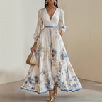 2025 European and American export women's clothing hot-selling long-sleeved printed short-sleeved resort dress, mid-length coat dress.