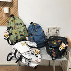 School bag male Korean version street trend junior high school student high school student backpack personality graffiti large capacity travel backpack