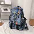 School bag for boys, junior high school students, Korean version, large capacity, high school backpack, personalized graffiti school bag, female, simple campus backpack