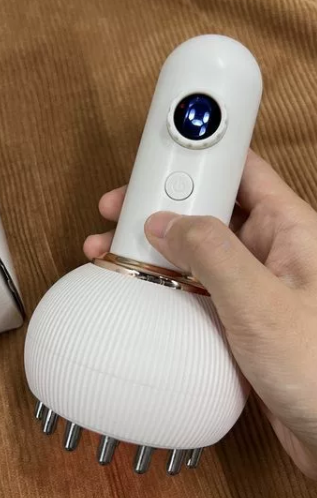Electric meridian brush scraping device for shoulder and neck massage, abdominal massage, back slimming, belly slimming, and full-body massage and cupping.